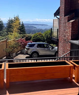 Custom cedar patio planters installed on a Vancouver deck for a Coastline Cedar customer