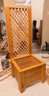 Handcrafted cedar trellis planter box with integrated lattice panel