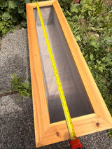 Long Cedar Balcony Planter with measuring tape showing approximately 48-inch length