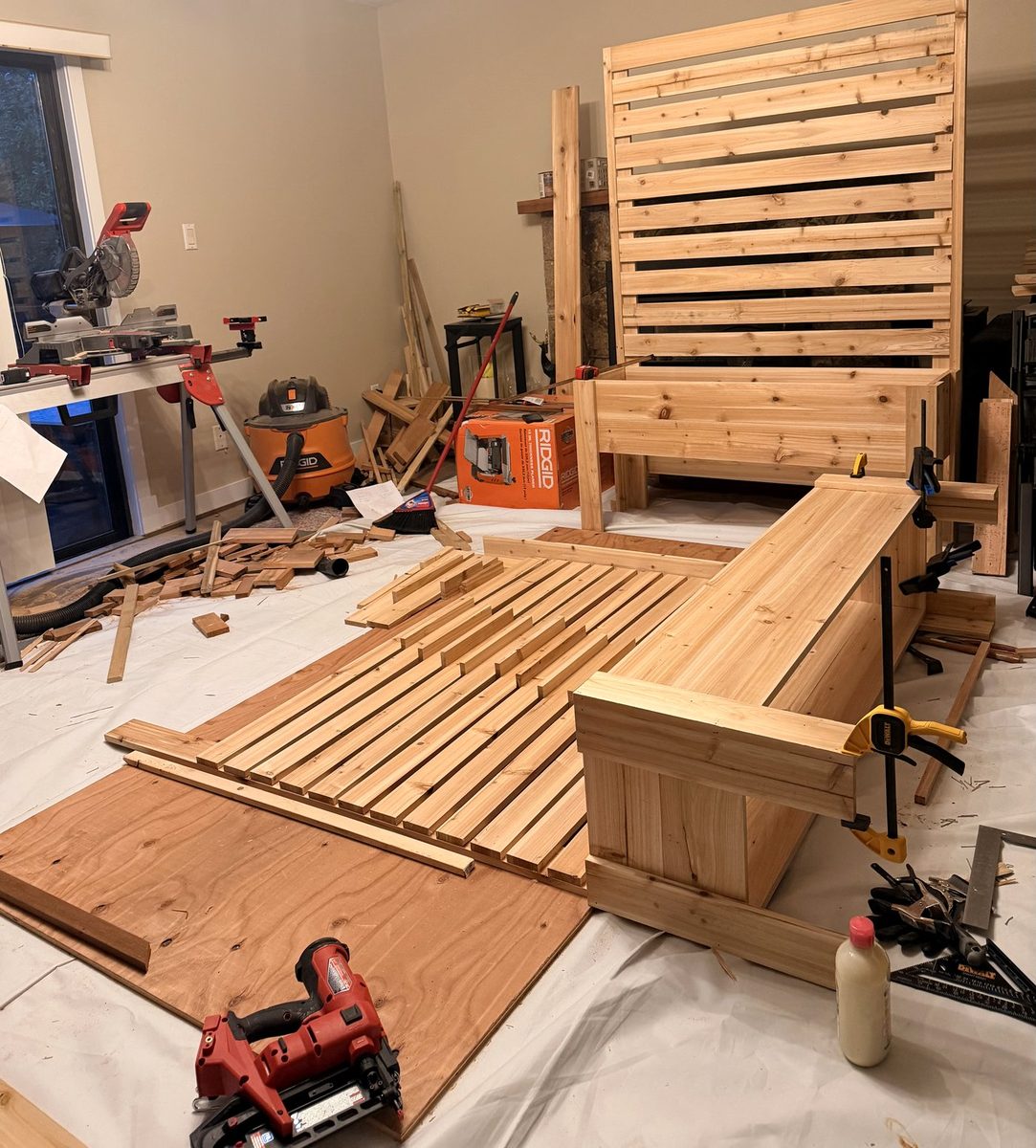 Cedar privacy planter with slat screen being assembled in the workshop